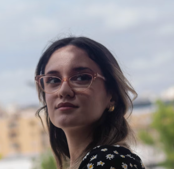 Woman with glasses outdoors